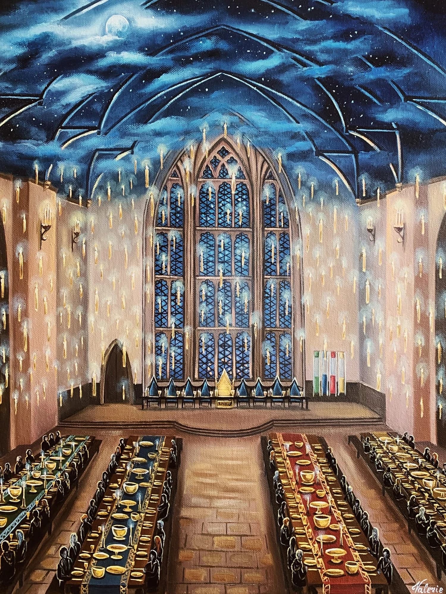The candlelit Great Hall at Hogwarts with long dining tables.